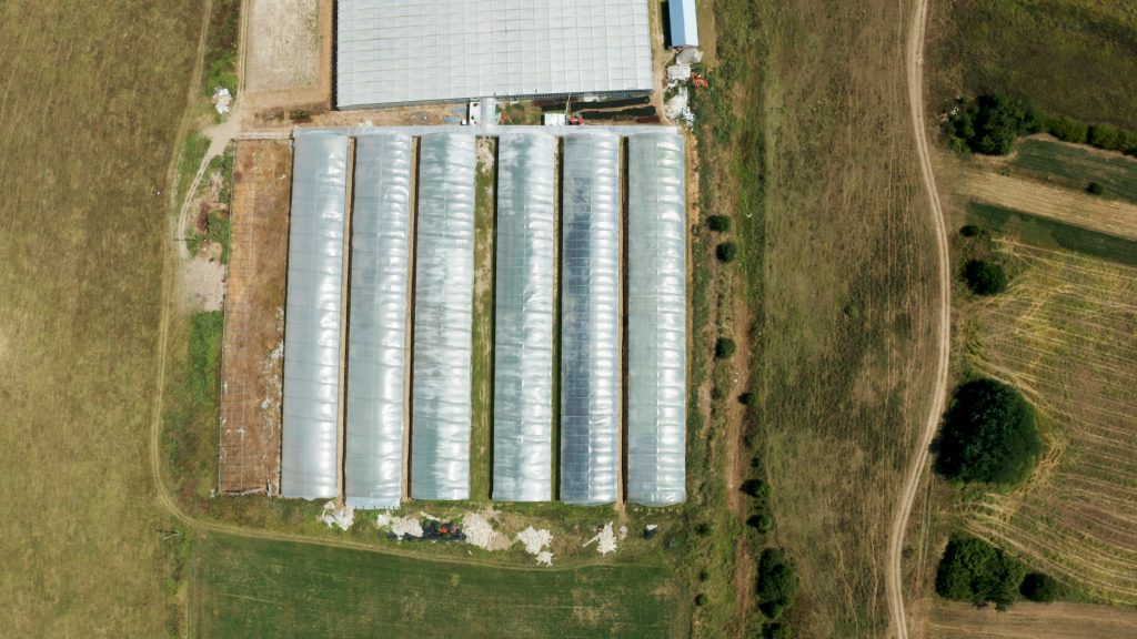 aerial view of empty agricultural hydroponics greenhouse plantation